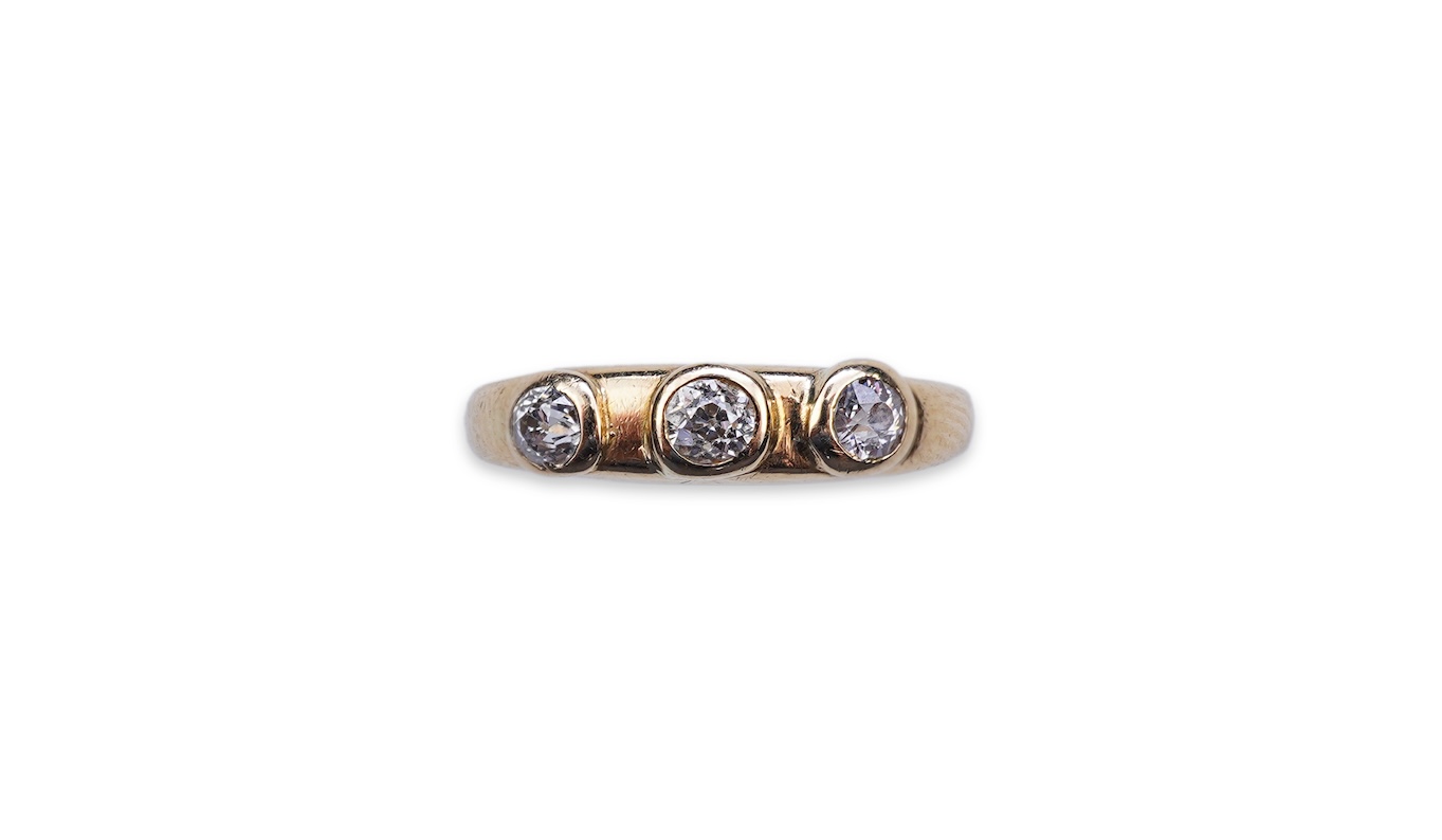 A three-stone diamond ring